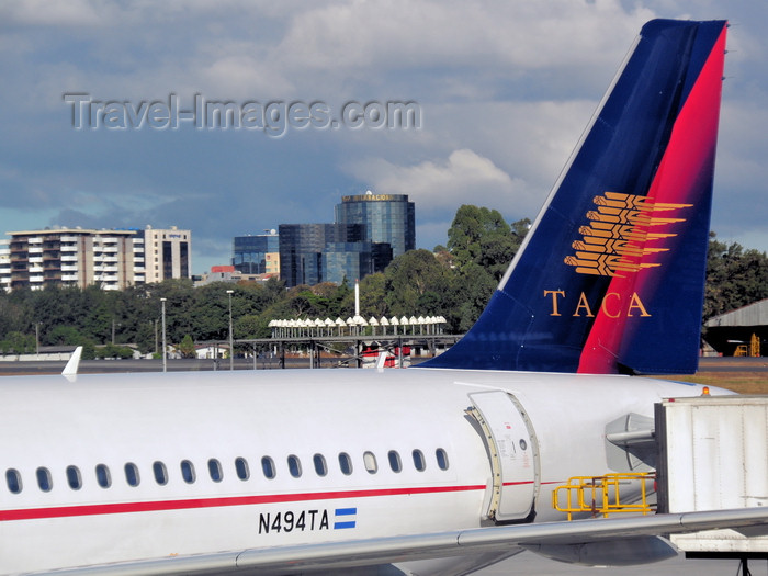 guatemala112: Ciudad de Guatemala / Guatemala city: airport - tail of a TACA Airbus A320-233 N494TA (cn 3042) - aircraft - photo by M.Torres - (c) Travel-Images.com - Stock Photography agency - Image Bank