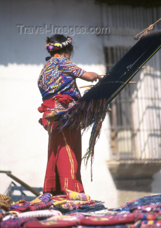 guatemala3: Guatemala - Antigua Guatemala (Sacatepequez province): woman weaving on a back strap loom (photographer: Mona Sturges) - (c) Travel-Images.com - Stock Photography agency - Image Bank