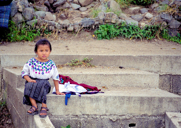 guatemala45: Guatemala - Lago de Atitlán: Lago de Atitlán: girl sitting on steps (photo by A.Walkinshaw) - (c) Travel-Images.com - Stock Photography agency - Image Bank