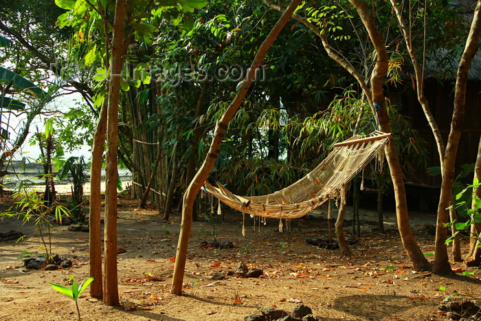 guinea-bissau116: Rubane Island, Bijagós Archipelago - UNESCO biosphere reserve, Bubaque sector, Bolama region, Guinea Bissau / Guiné Bissau: Hotel Punta Anchaca, vegetation and hammock / Hotel Punta Anchaca, vegetação, rede de descanso - photo by R.V.Lopes - (c) Travel-Images.com - Stock Photography agency - Image Bank