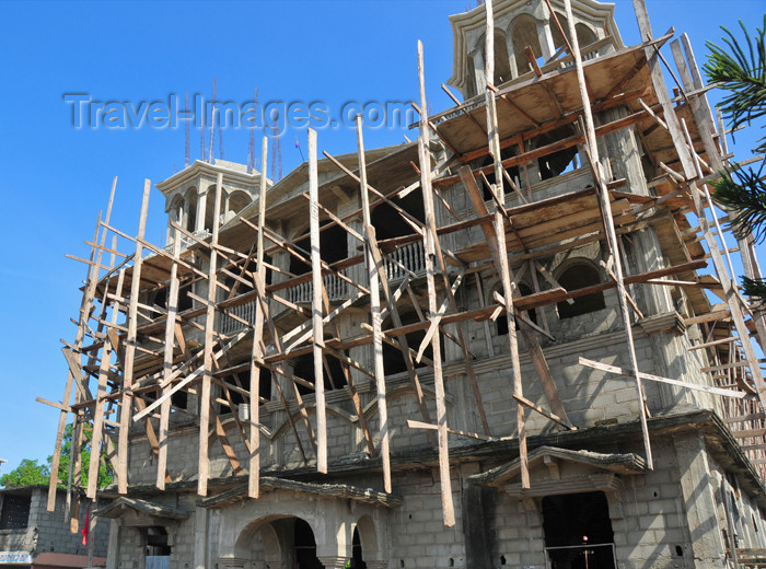 haiti51: Ouanaminthe / Juana Mendez, Nord-Est Department, Haiti: building one more church - Haiti is prolific in churches and lottery shops - photo by M.Torres - (c) Travel-Images.com - Stock Photography agency - Image Bank