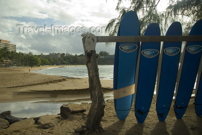 hawaii11: Hawaii - Kauai Island: Nawiliwili Beach: surf boardsin foreground and ocean beach and Marriott resort hotel in background - Hawaiian Islands - photo by D.Smith - (c) Travel-Images.com - Stock Photography agency - Image Bank