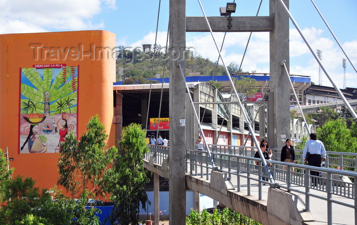 honduras53: Tegucigalpa, Honduras: bridge over Río Choluteca, leading to La Isla market - National Stadium and Peace Monument in the background - photo by M.Torres - (c) Travel-Images.com - Stock Photography agency - Image Bank