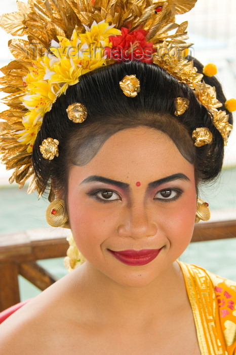 indonesia121: Padangbai, Bali, Indonesia: close-up portrait of young Balinese woman wearing floral hat - photo by D.Smith - (c) Travel-Images.com - Stock Photography agency - Image Bank