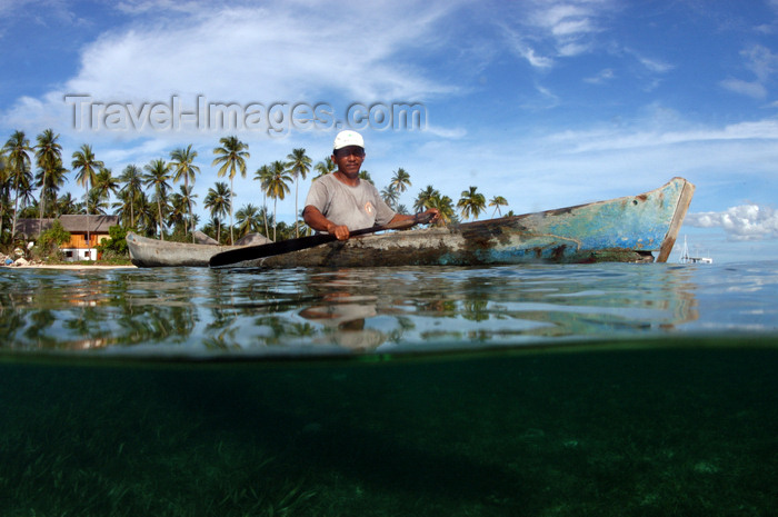 indonesia81: Pulau Tolandono, Wakatobi archipelago, Tukangbesi Islands, South East Sulawesi, Indonesia: log canoe and local man at sea - Banda Sea - Wallacea - photo by D.Stephens - (c) Travel-Images.com - Stock Photography agency - Image Bank