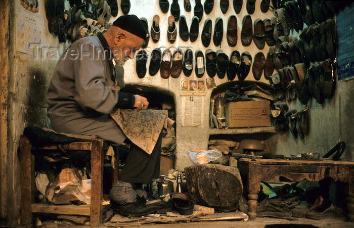 iran133: Iran - Yazd: shoemaker at work in the bazaar - cobbler - photo by W.Allgower - (c) Travel-Images.com - Stock Photography agency - Image Bank