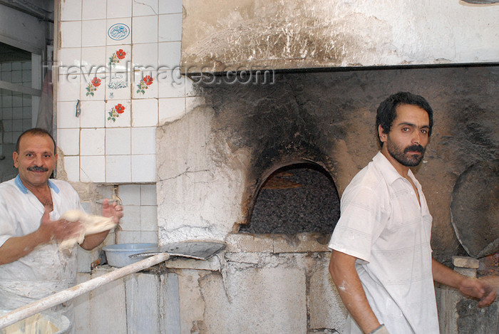 iran154: Iran - Shiraz: bakers at work - bakery ovens - photo by M.Torres - (c) Travel-Images.com - Stock Photography agency - Image Bank