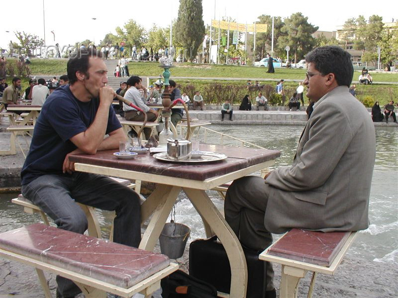 iran19: Iran - Isfahan / Esfahan / IFN (Esfahan province): smoking a water pipe - Naqsh-e Jahan Square - photo by Brenda Nassarian - (c) Travel-Images.com - Stock Photography agency - Image Bank