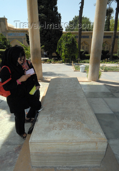 iran223: Iran - Shiraz: Mausoleum of Hafez - a woman read as poem by the Hafez's alabaster tombstone - photo by M.Torres - (c) Travel-Images.com - Stock Photography agency - Image Bank