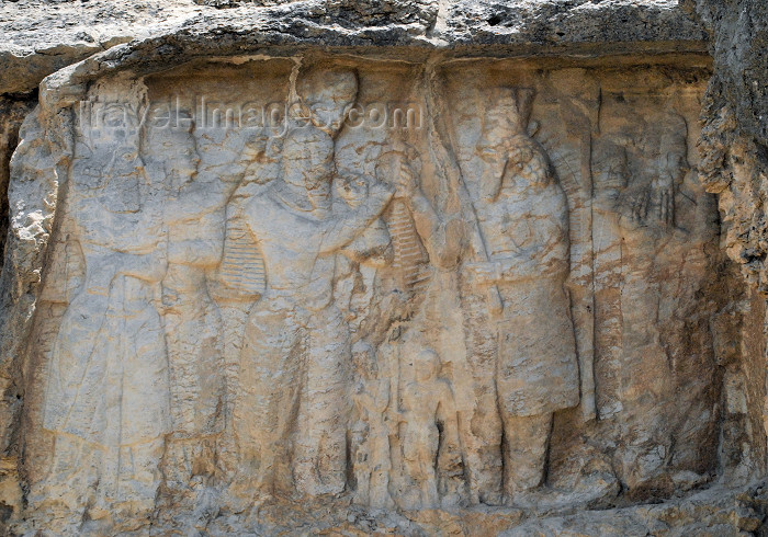 iran314: Iran - Naqsh-e Rajab: investiture of king Ardashir I, founder of the Sasanian empire - Ahuramazda (Hormuzd) hands a ring, cydaris, symbol of power to Ardashir, on the left - Ahuramazda carries the barsom, a bundle of sacred twigs - photo by M.Torres - (c) Travel-Images.com - Stock Photography agency - Image Bank