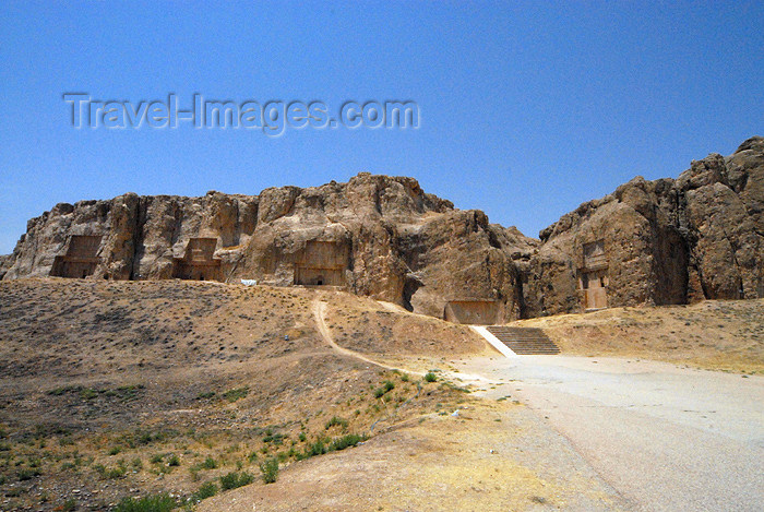 iran335: Iran - Naqsh-e Rustam: rock  hewn tombs of the Achaemenid kings - hypogea - from left to right - tombs of Darius II Nothus, Artaxerxes I Makrocheir, Darius I the Great, the relief of the investiture of Narseh, tomb of Xerxes - photo by M.Torres - (c) Travel-Images.com - Stock Photography agency - Image Bank