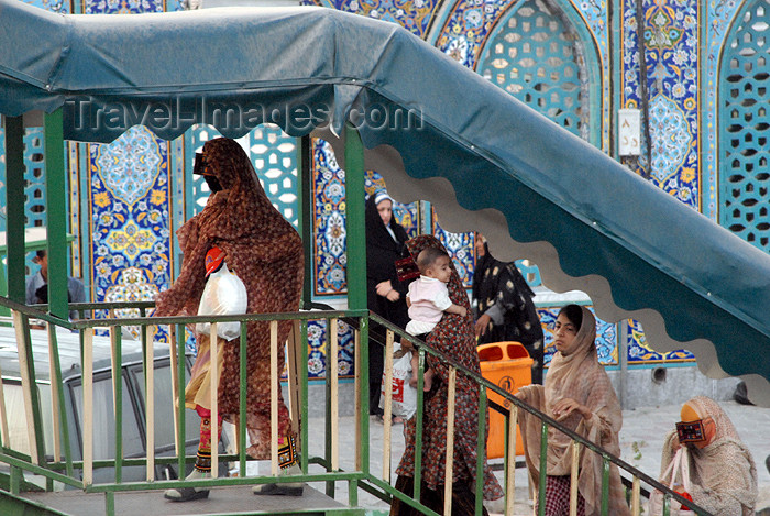 iran393: Iran -  Bandar Abbas: masqued women arrive at the main Sunni mosque (borqas) - photo by M.Torres - (c) Travel-Images.com - Stock Photography agency - Image Bank