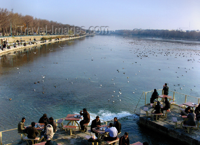 iran535: Isfahan / Esfahan, Iran: life is good - people at a café built on the Zayandeh River - photo by N.Mahmudova - (c) Travel-Images.com - Stock Photography agency - Image Bank