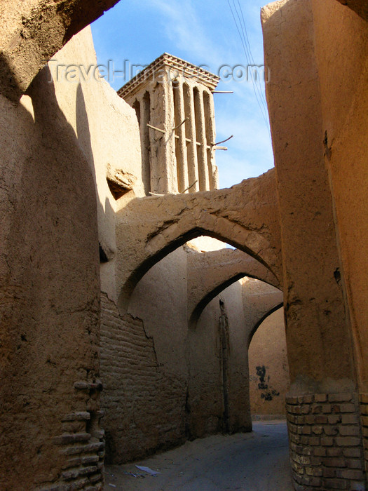 iran548: Yazd, Iran: a quintessential alley of Yazd, with pointed arches and a wind catcher - old town - photo by N.Mahmudova - (c) Travel-Images.com - Stock Photography agency - Image Bank