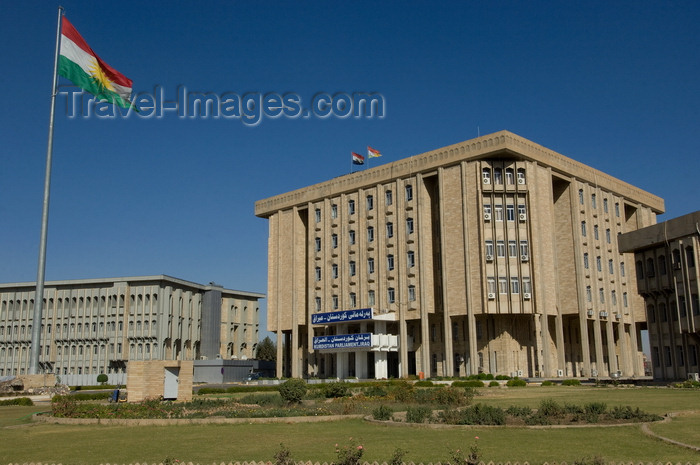 iraq89: Arbil / Erbil / Irbil / Hawler, Kurdistan, Iraq: Kudish flag flying in front of the Kurdish Parliament - photo by J.Wreford - (c) Travel-Images.com - Stock Photography agency - Image Bank