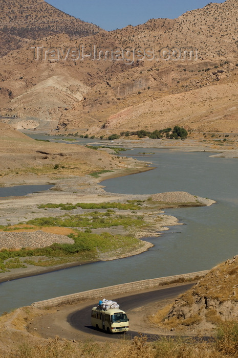 iraq98: Zab River, Kurdistan, Iraq: Kurdish Landscape - bus on the road along the river - photo by J.Wreford - (c) Travel-Images.com - Stock Photography agency - Image Bank