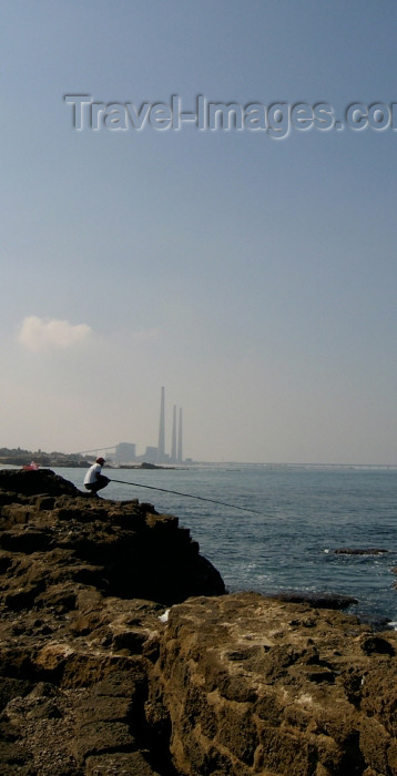 israel124: Israel - Qesarriya / Caesarea Maritima / Caesarea Palaestina - Hadera: angler and the Orot Rabin power station - photo by Efi Keren - (c) Travel-Images.com - Stock Photography agency - Image Bank