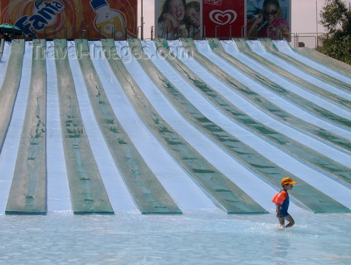 israel256: Israel - Shfaim: water park - child alone by the water chutes - blue lines - photo by E.Keren - (c) Travel-Images.com - Stock Photography agency - Image Bank