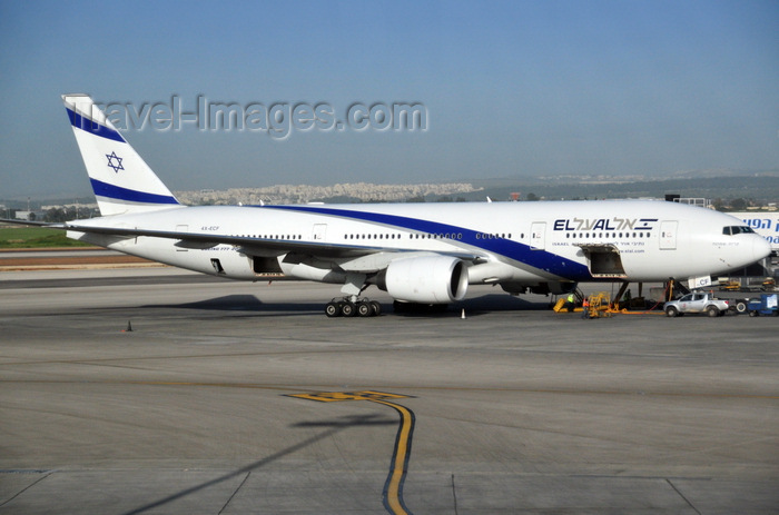 israel329: Tel Aviv Ben Gurion Airport, Central District, Israel: El Al Israel Airlines Boeing 777-258(ER), registration 4X-ECF (cn 36084) - airliner being serviced at Terminal 3 - photo by M.Torres - (c) Travel-Images.com - Stock Photography agency - Image Bank