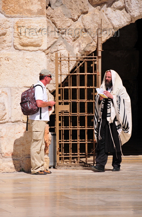 israel401: Jerusalem,  Israel: secular man with a backpack and an Orthodox Jew covered in a Kosher wool Tallit prayer shawl - Western Wall plaza - photo by M.Torres - (c) Travel-Images.com - Stock Photography agency - Image Bank