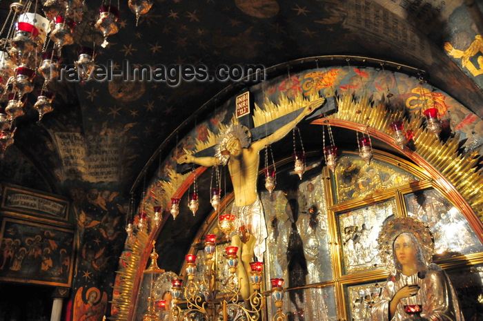 israel444: Jerusalem, Israel: Holy Sepulcher church - Calvary (Golgotha), traditionally regarded as the site of Jesus' crucifixion - main altar, run by the Greek Orthodox, which contains The Rock of Calvary, 12th Station of the Cross - Christian quarter - photo by M.Torres - (c) Travel-Images.com - Stock Photography agency - Image Bank