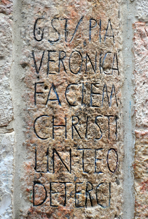 israel458: Jerusalem, Israel: Via Dolorosa -  Station 6 - dedicated to the woman, St. Veronica, who wiped Jesus face - Latin inscription 'Pia Veronica faciem christi linteo deterci', 'pious Veronica wiped the face of Christ with a cloth' - photo by M.Torres - (c) Travel-Images.com - Stock Photography agency - Image Bank