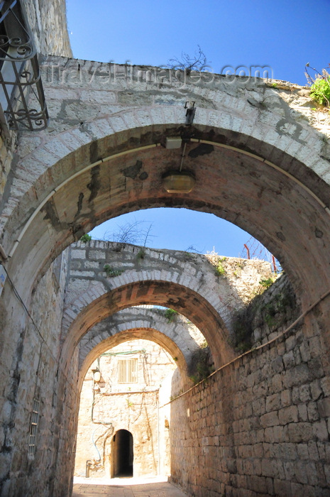 israel489: Jerusalem, Israel: stone masonry arches on Saint James Street - Armenian quarter - photo by M.Torres - (c) Travel-Images.com - Stock Photography agency - Image Bank