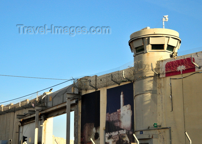 israel493: Jerusalem, Israel: Rachel's Tomb Crossing Checkpoint, main vehicle gate leading to  Bethlehem and watch tower - part of the Israeli West Bank barrier, security fence made of concrete slabs - poster with David's tower -  Israeli Defense Forces (IDF) - photo by M.Torres - (c) Travel-Images.com - Stock Photography agency - Image Bank