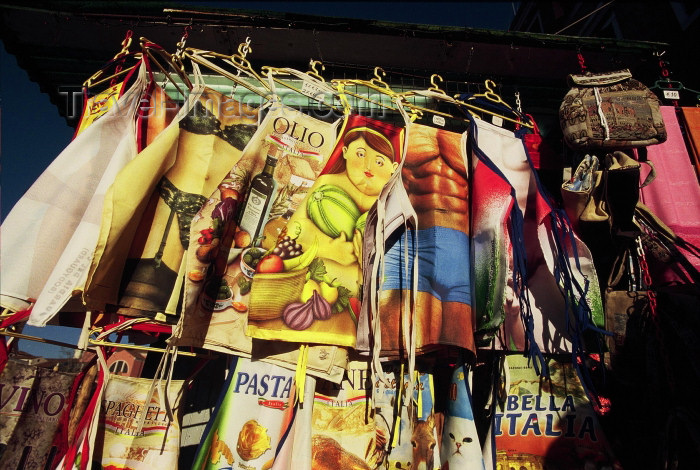 italy222: Italy / Italia - Venice / Venezia / Venise / Venedig: aprons for sale near Stazione FS Santa Lucia (photo by M.Gunselman) - (c) Travel-Images.com - Stock Photography agency - Image Bank