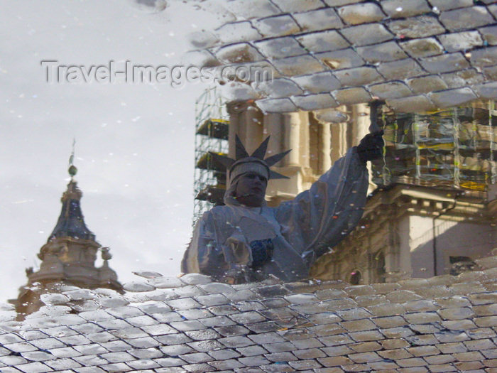 italy269: Italy / Italia - Rome: water - reflection on a puddle - statue of Liberty - pavement - photo by Emanuele Luca - (c) Travel-Images.com - Stock Photography agency - Image Bank