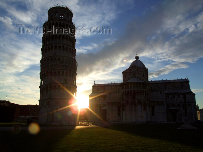 italy402: Pisa - Duomo and Pisa tower - silhouetted against the sun - photo by M.Bergsma - (c) Travel-Images.com - Stock Photography agency - Image Bank