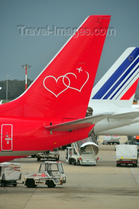 italy437: Rome, Italy: double heart on an aircraft tail - Fiumicino - Leonardo da Vinci Airport - photo by M.Torres - (c) Travel-Images.com - Stock Photography agency - Image Bank