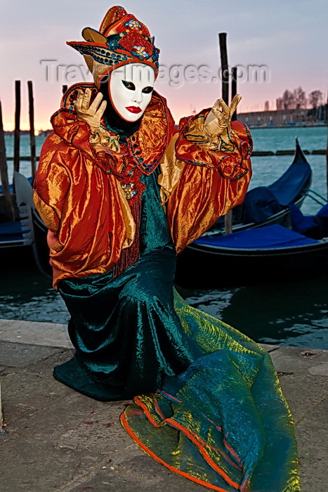 italy515: Carnival participant with Carnival costume at Dawn by Canale di San Marco, Venice - photo by A.Beaton - (c) Travel-Images.com - Stock Photography agency - Image Bank