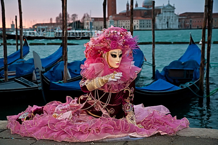 italy517: Carnival participant with Carnival costume at Dawn by Canale di San Marco, Venice - photo by A.Beaton - (c) Travel-Images.com - Stock Photography agency - Image Bank