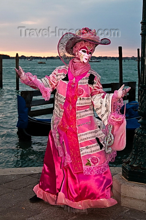 italy521: Carnival participant with Carnival costume at Dawn by Canale di San Marco, Venice - photo by A.Beaton - (c) Travel-Images.com - Stock Photography agency - Image Bank