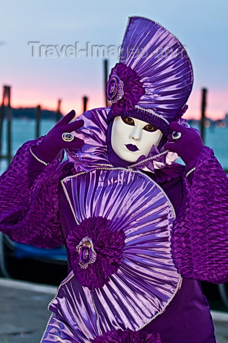 italy525: Carnival participant with Carnival costume at Dawn by Canale di San Marco, Venice - photo by A.Beaton - (c) Travel-Images.com - Stock Photography agency - Image Bank