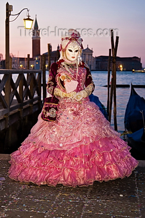 italy530: Carnival participant with Carnival costume at Dawn by Canale di San Marco, Venice - photo by A.Beaton - (c) Travel-Images.com - Stock Photography agency - Image Bank