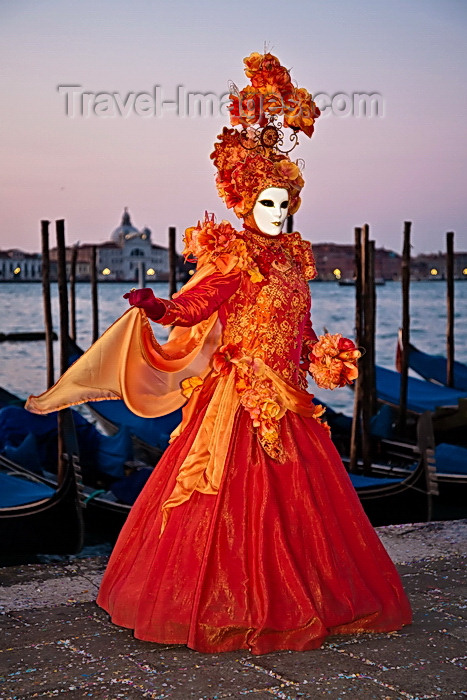 italy532: Carnival participant with Carnival costume at Dawn by Canale di San Marco, Venice - photo by A.Beaton - (c) Travel-Images.com - Stock Photography agency - Image Bank