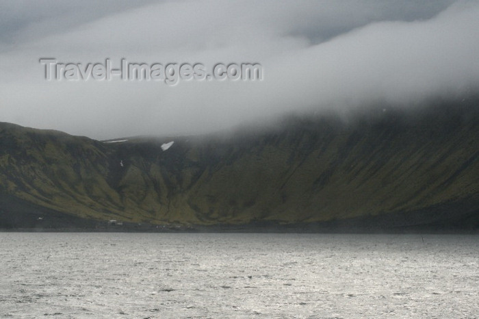 jan-mayen3: Jan Mayen island: eroded slopes and the radio station buildings - Loran-C NATO station - South-Jan - photo by R.Behlke - (c) Travel-Images.com - Stock Photography agency - Image Bank