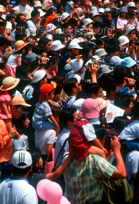 japan85: Disneyland - children watch a show, Tokyo, Japan. photo by B.Henry - (c) Travel-Images.com - Stock Photography agency - Image Bank