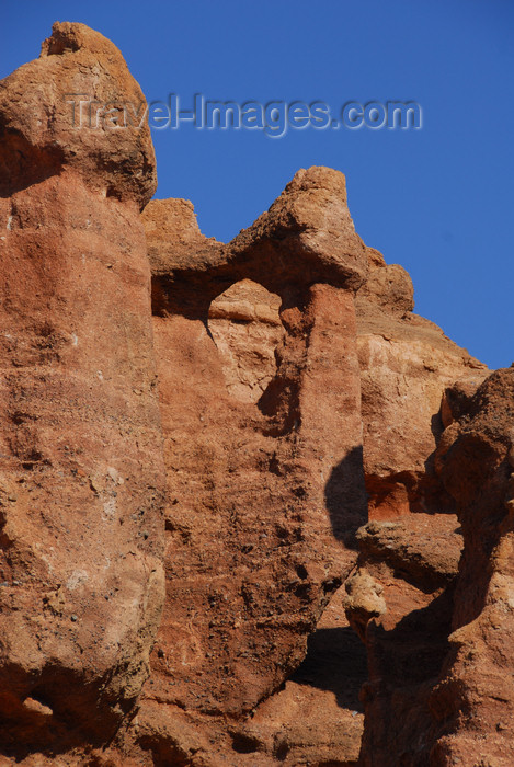 kazakhstan104: Kazakhstan, Charyn Canyon: Valley of the Castles - window between two fairy chimneys - photo by M.Torres - (c) Travel-Images.com - Stock Photography agency - Image Bank