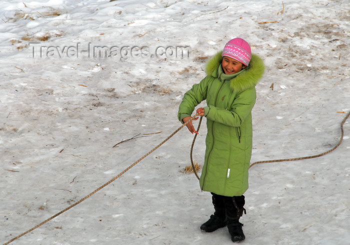 kazakhstan142: Kazakhstan - Chimbulak ski-resort, Almaty: woman using a rope to walk on the ice - photo by M.Torres - (c) Travel-Images.com - Stock Photography agency - Image Bank