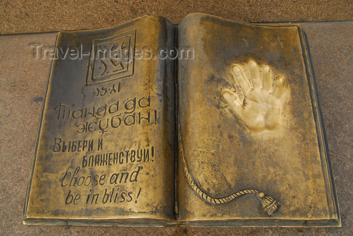 kazakhstan270: Kazakhstan, Almaty: Republic square - make a wish - book and hand - photo by M.Torres - (c) Travel-Images.com - Stock Photography agency - Image Bank