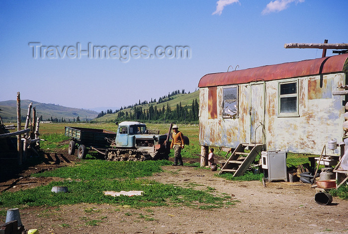kazakhstan3: Kazakhstan - Almaty oblys: a farmer with his old tractor and a sheet metal house - photo by E.Petitalot - (c) Travel-Images.com - Stock Photography agency - Image Bank