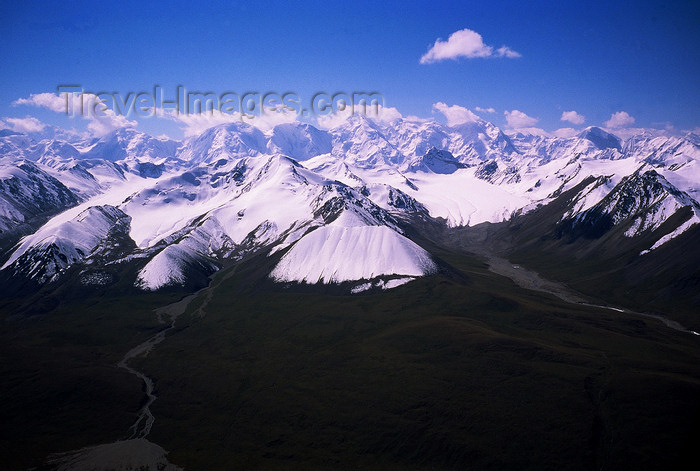 kazakhstan62: Kazakhstan - Tian Shan mountains and a river as it leaves a lake - photo by E.Petitalot - (c) Travel-Images.com - Stock Photography agency - Image Bank