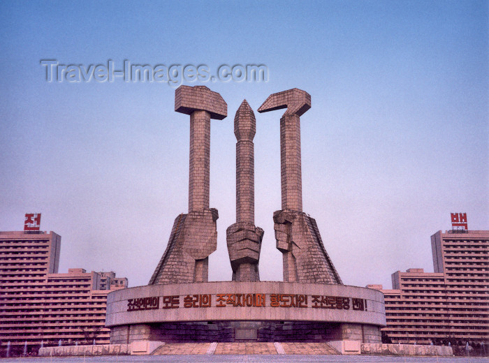 korean19: North Korea / DPRK - Pyongyang / FNJ: Monument to Party Foundation - hands holding a hammer, a hoe and a brush - Korean Workers' Party symbol - Munsu Street - photo by M.Torres - (c) Travel-Images.com - Stock Photography agency - Image Bank