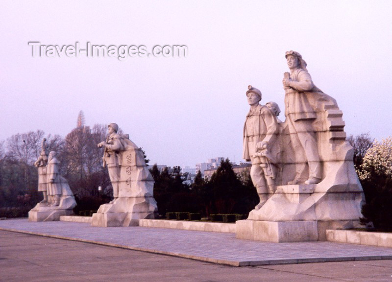 korean20: North Korea / DPRK - Pyongyang: statues by the Tower of the Juche Idea - symbolize Juche Industry, Impregnable Fortress and Longevity - photo by M.Torres - (c) Travel-Images.com - Stock Photography agency - Image Bank