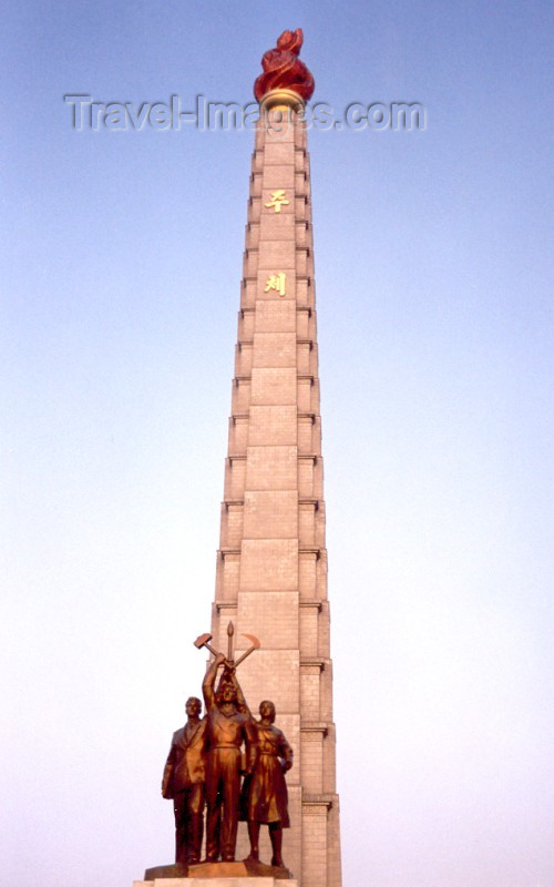 korean21: North Korea / DPRK - Pyongyang: Tower of the Juche Idea - Self-Reliance - 70 granite tiers which symbolize the 70th birthday of Kim Il Sung - the torch symbolizes the victory of Juche - photo by M.Torres - (c) Travel-Images.com - Stock Photography agency - Image Bank
