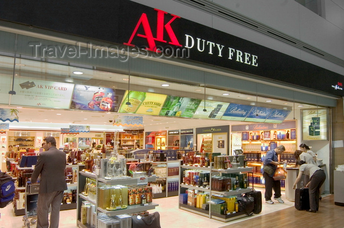 koreas79: Seoul, South Korea: airport terminal duty free store front of AK with clients and various products including spirits - Incheon International Airport - photo by C.Lovell - (c) Travel-Images.com - Stock Photography agency - Image Bank