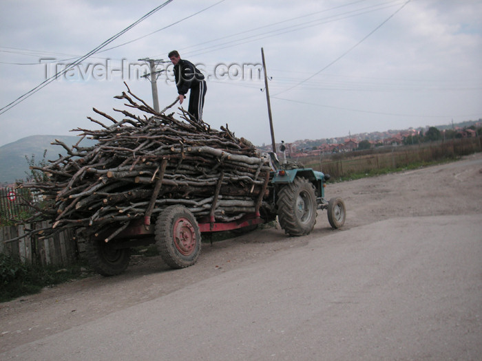 kosovo19: Kosovo: rural life - tractor and wood - photo by A.Kilroy - (c) Travel-Images.com - Stock Photography agency - Image Bank